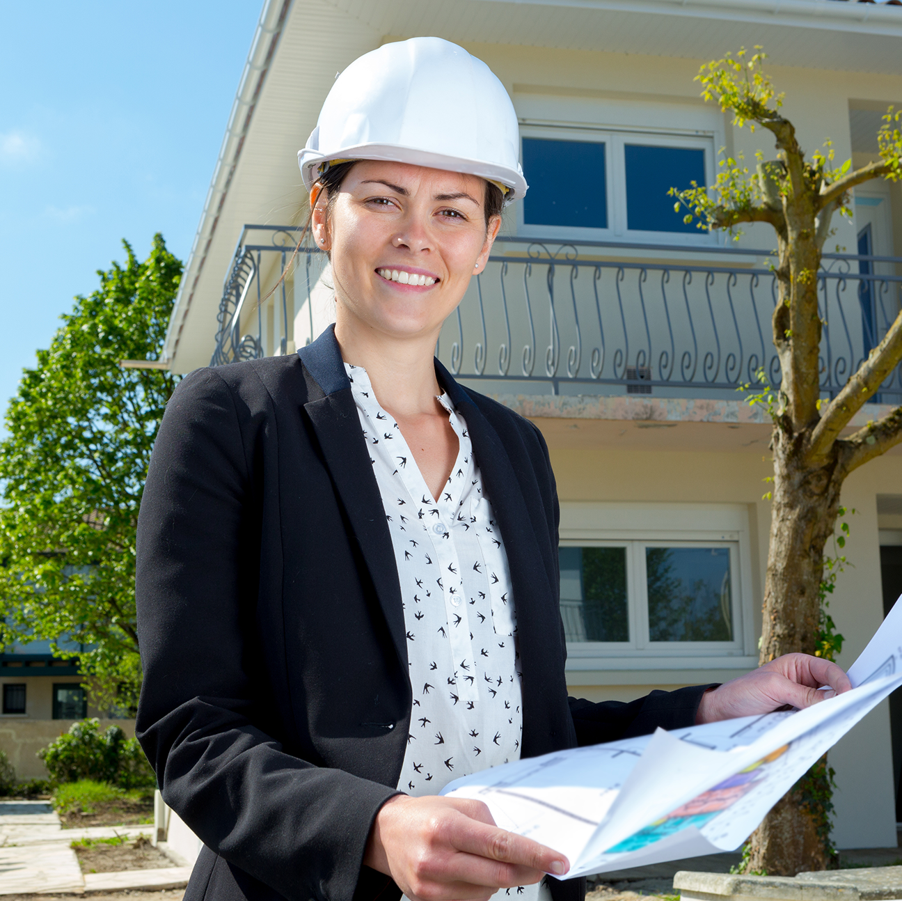 Architect reviewing 3D renderings on screen